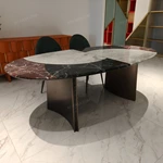 Patchwork Marble Dining Table with Flared Panel Legs and Textured Edge